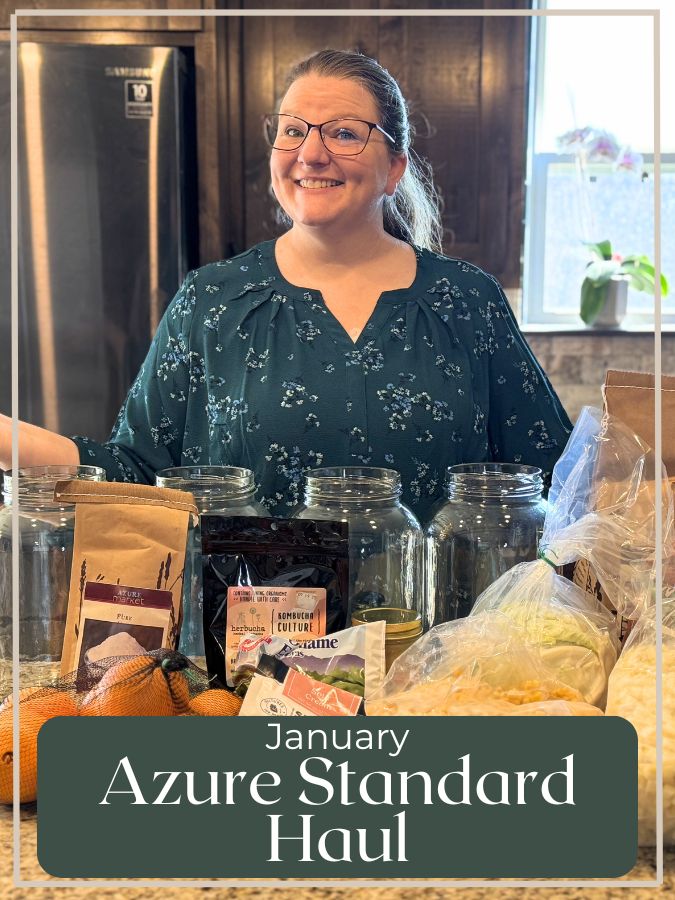 woman in green shirt with Azure standard haul